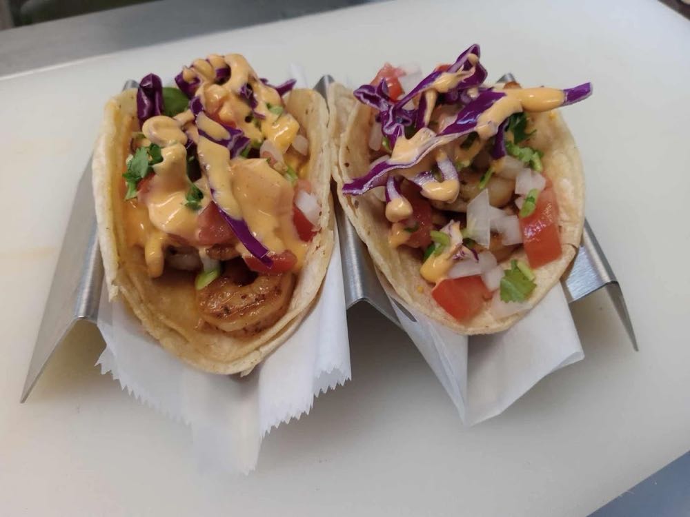 Fresh tacos plated and ready to eat at Marco's Tacos in Imperial, MO
