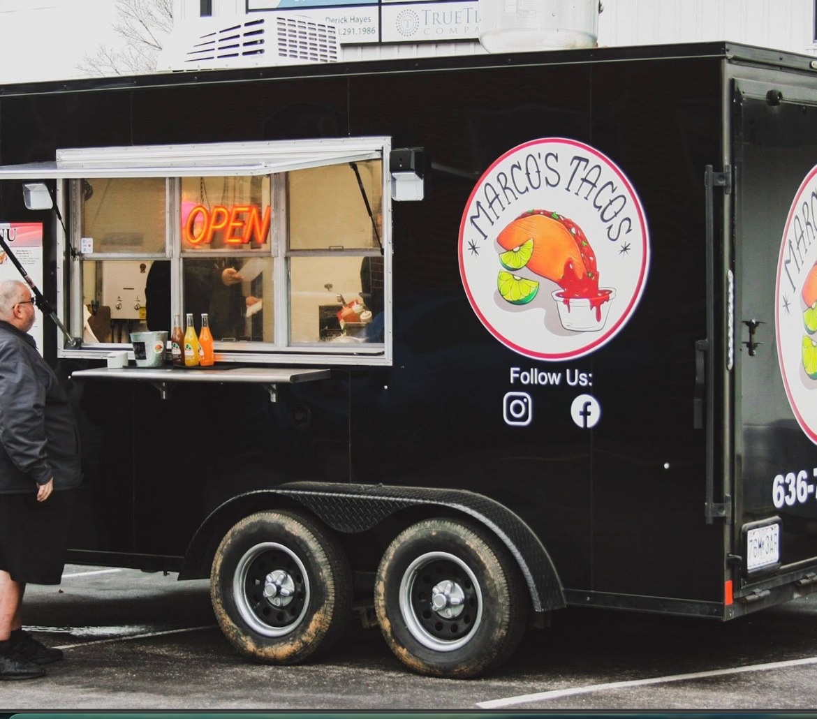 Marco's Tacos black food truck with service window